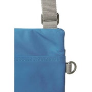 Roka Blue Chelsea Sustainable Nylon Pocket Sling Bag