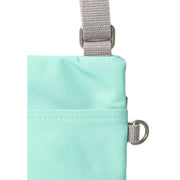 Roka Turquoise Chelsea Sustainable Nylon Pocket Sling Bag