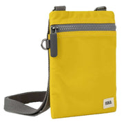 Roka Yellow Chelsea Sustainable Nylon Pocket Sling Bag